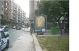 Mupi publicitario de dos caras de Marco Visual en la calle Mayor de Molina de Segura